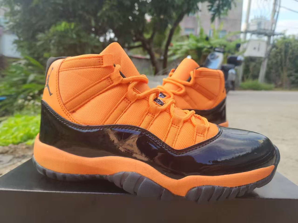 Air Jordan 11 Retro Black / Orange