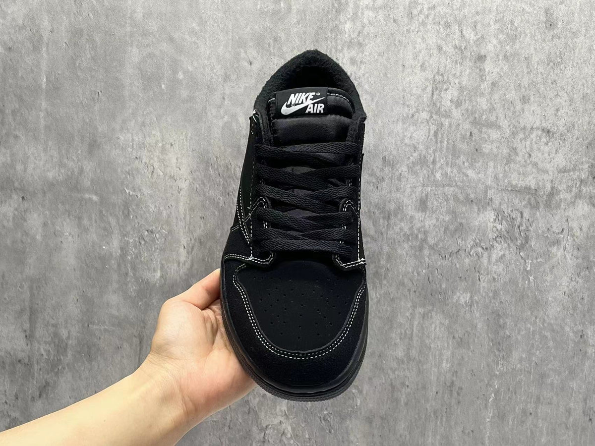 Air Jordan Black and White Leather Sneakers