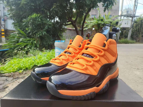 Air Jordan 11 Retro Black / Orange