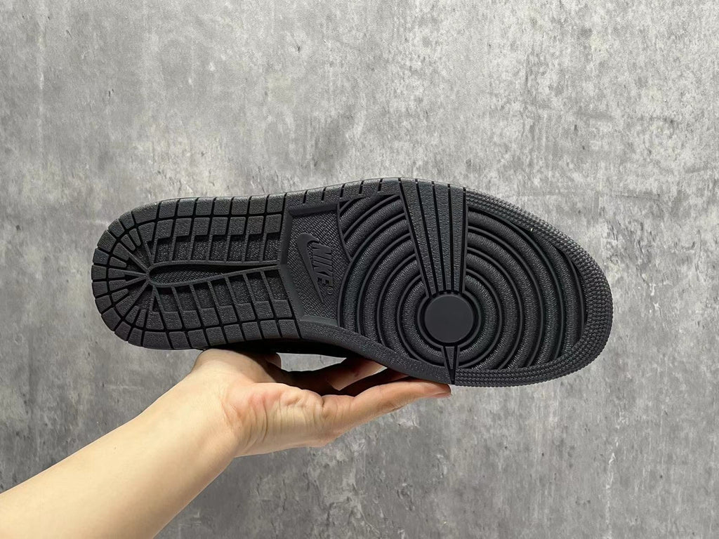 Air Jordan Black and White Leather Sneakers