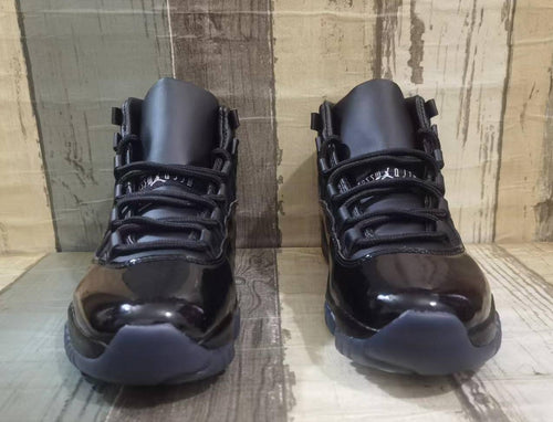 Air Jordan 11 x Comme des Garçons Homme Plus “Black”