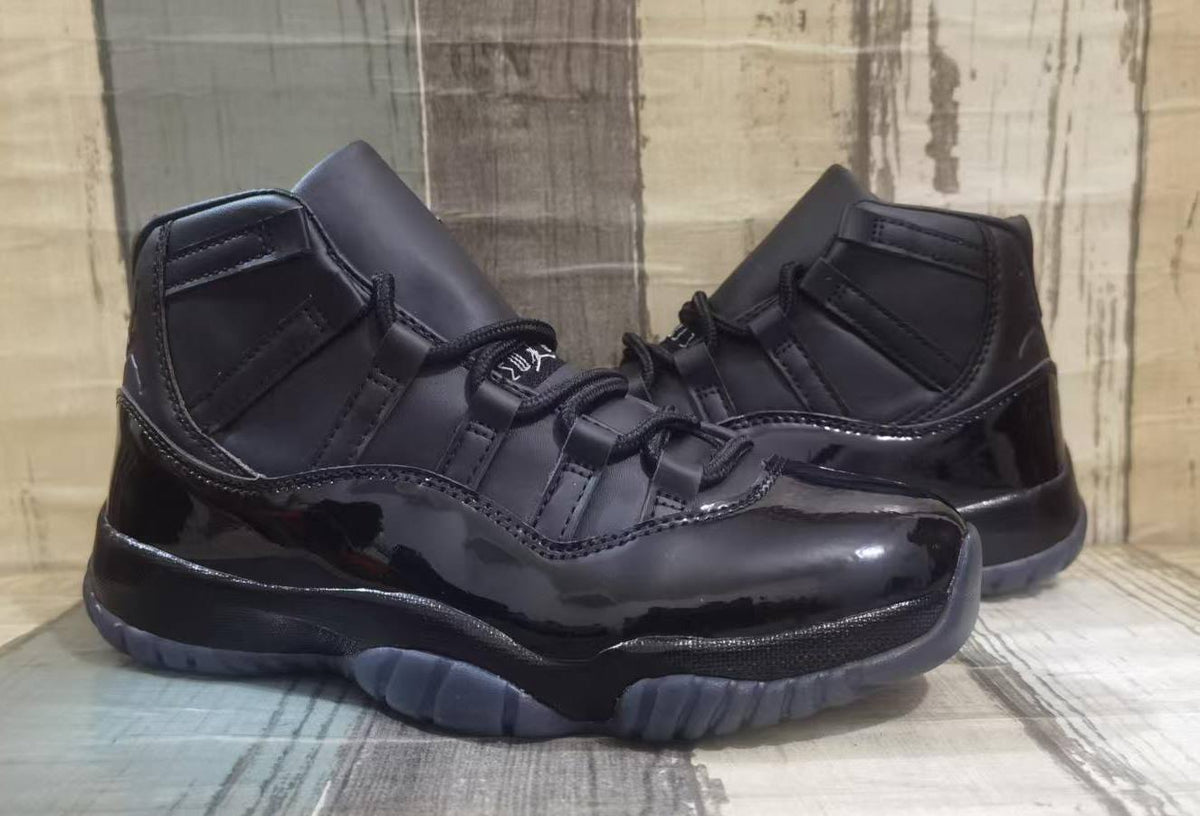 Air Jordan 11 x Comme des Garçons Homme Plus “Black”