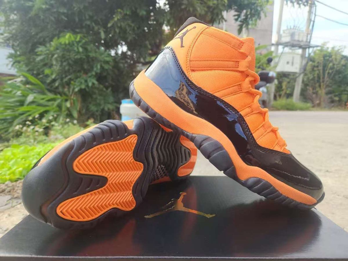 Air Jordan 11 Retro Black / Orange